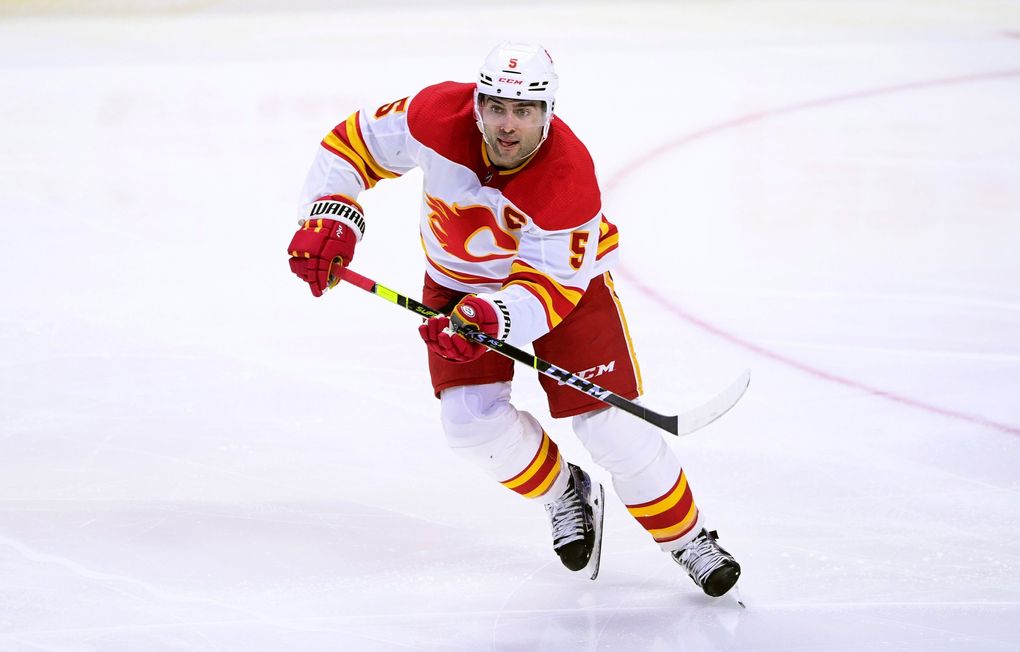 In this March 22, 2021 file photo, Calgary Flames captain Mark Giordano skates up the ice during the third period of an NHL hockey game against the Ottawa Senators in Ottawa, Ontario. (Sean Kilpatrick / AP)