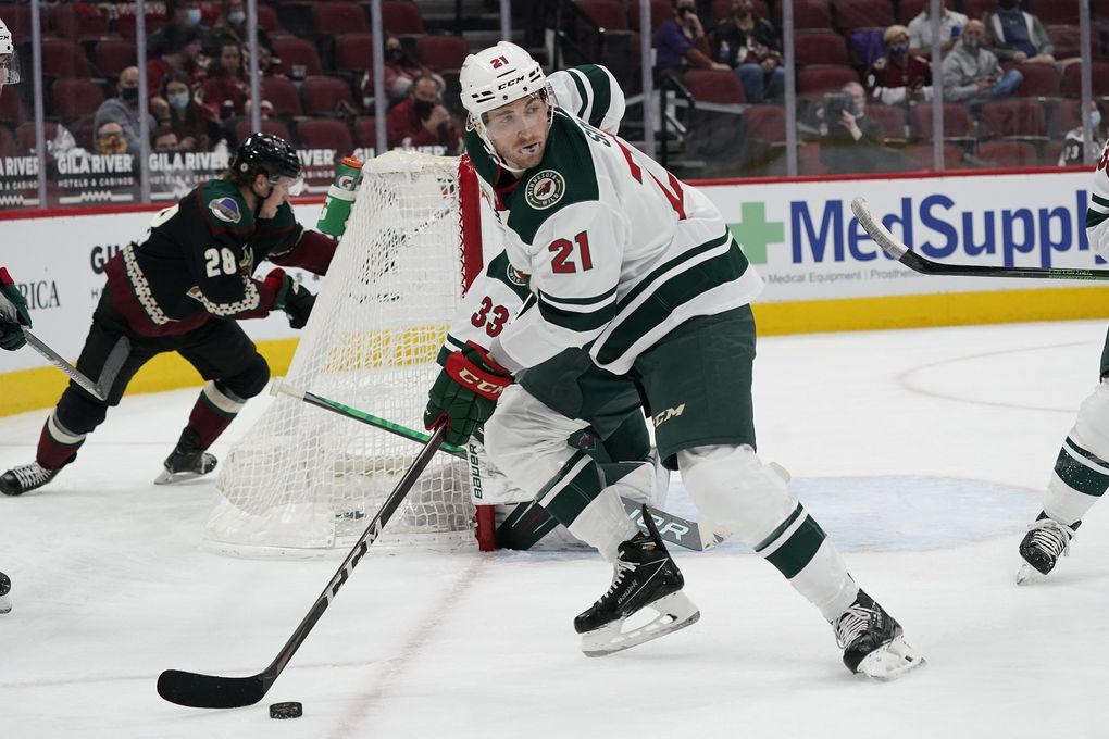 Minnesota Wild defenseman Carson Soucy skates with the puck against the Arizona Coyotes during the first period of a game Wednesday, April 21, 2021, in Glendale, Ariz. (Ross D. Franklin / AP)