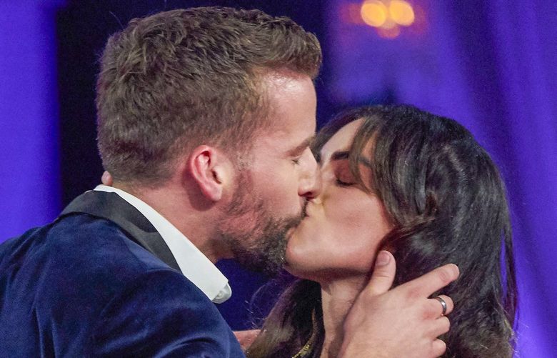 Connor Brennan and a woman in the audience who walked up to him and kissed him on Monday’s “The Bachelorette: The Men Tell All”.