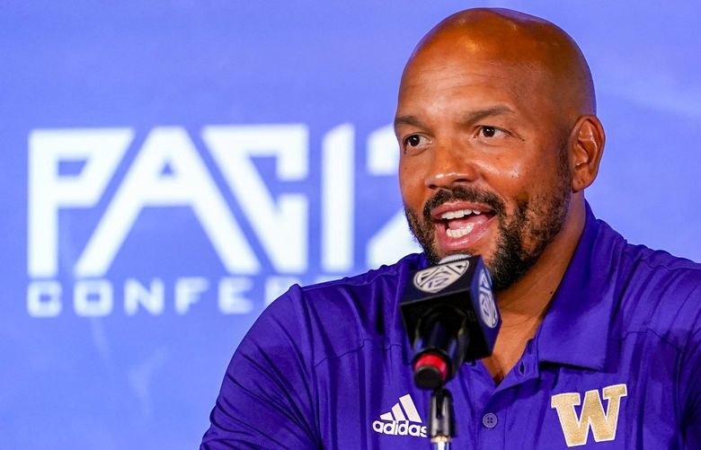 Washington head coach Jimmy Lake conducts an interview during the Pac-12 Conference NCAA college football Media Day Tuesday, July 27, 2021, in Los Angeles. (AP Photo/Marcio Jose Sanchez) CAMS142