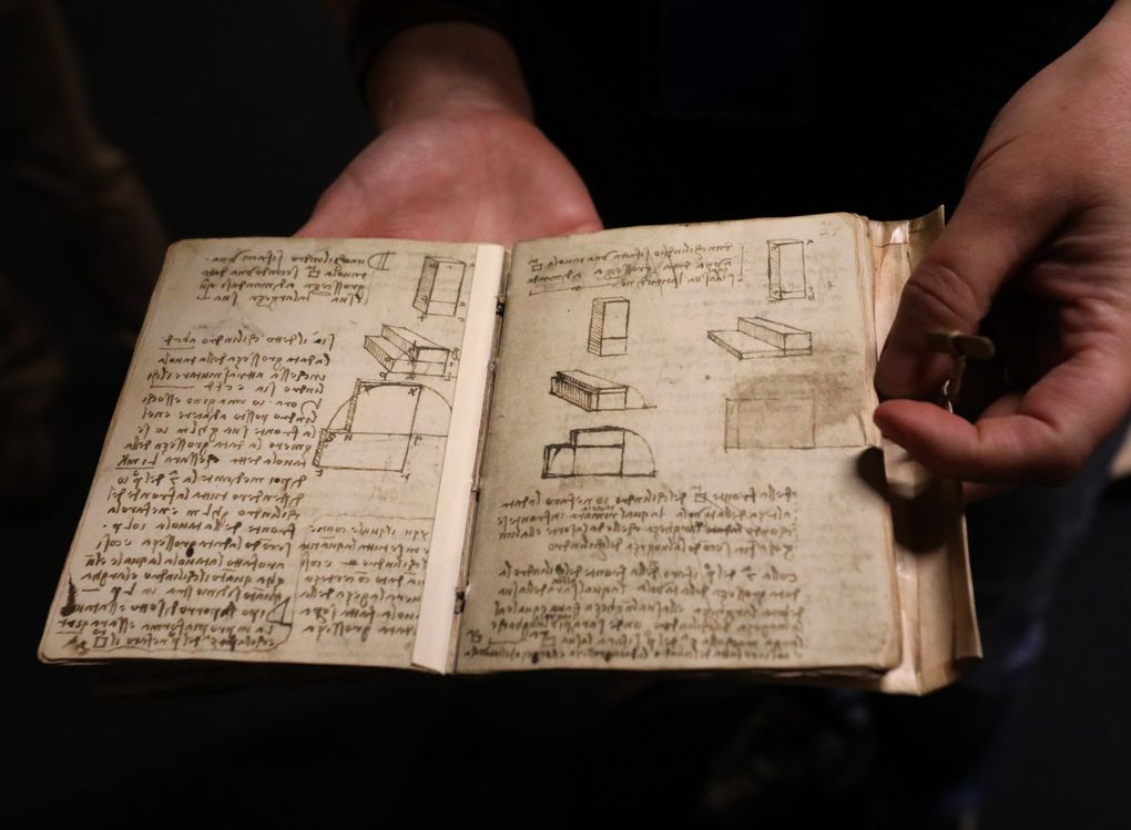 Leonardo da Vinci’s notebooks are works of art in themselves. This is a reproduction on exhibit at MOHAI as part of the “Da Vinci — Inventions” show starting July 31. (Alan Berner / The Seattle Times)