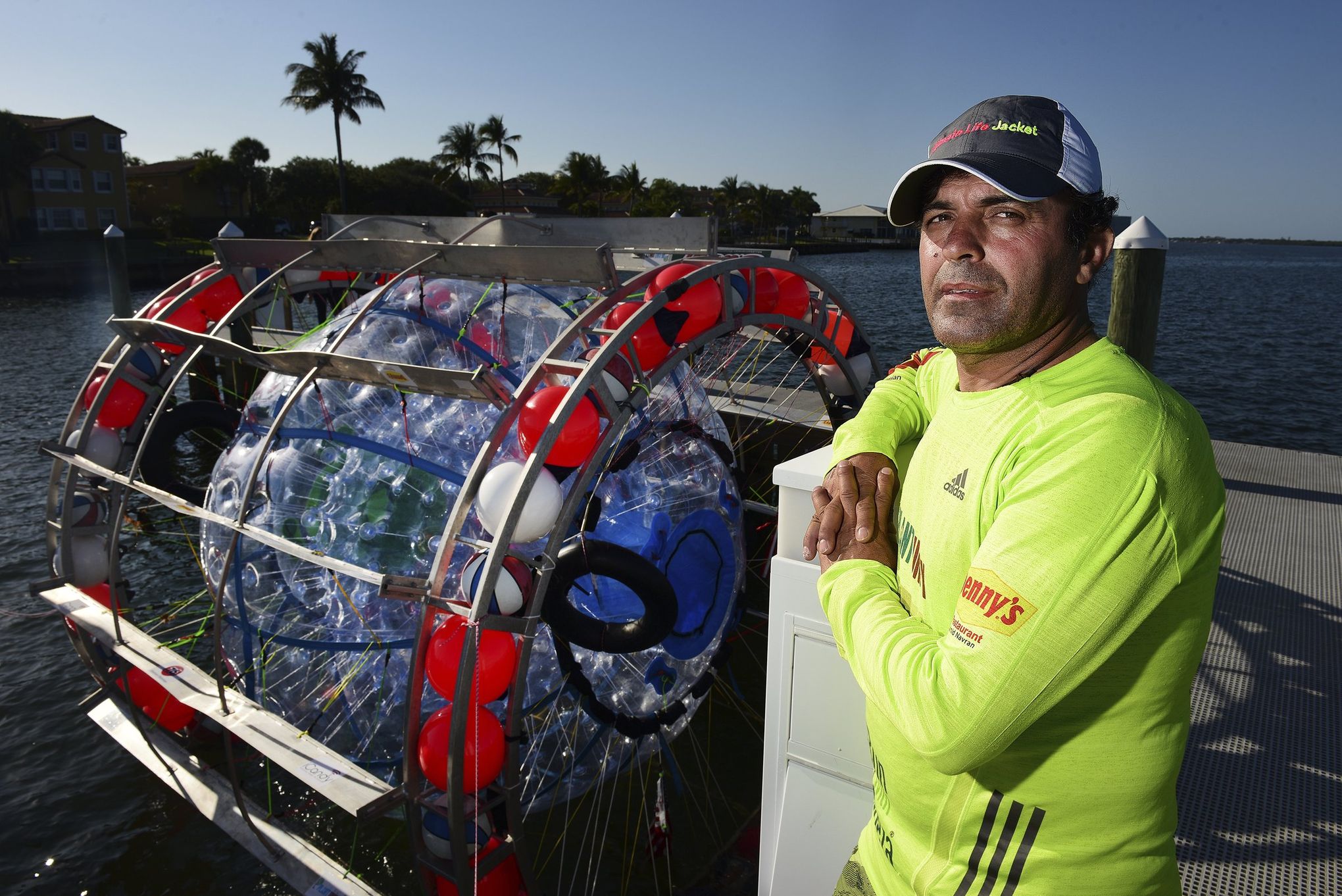 A giant red hamster wheel washed up on a Florida beach. And a man was  inside | The Seattle Times