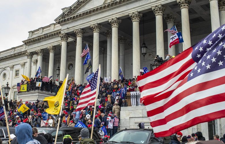 FILE – A pro-Trump mob invades the Capitol building in Washington, Jan. 6, 2021. If nothing else, the Senate impeachment trial has served at least one purpose: It stitched together the most comprehensive and chilling account to date of last month’s deadly assault on the Capitol, shedding light on the biggest explosion of violence in the seat of Congress in two centuries. (Jason Andrew/The New York Times)