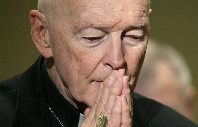 FILE – In this Nov. 14, 2011, file photo, then Cardinal Theodore McCarrick prays during the United States Conference of Catholic Bishops’ annual fall assembly in Baltimore. A lawyer says the key accuser in the sex abuse case against ex-Cardinal Theodore McCarrick has met with New York City prosecutors, evidence that the scandal that has convulsed the papacy is now part of the broader U.S. law enforcement investigation into sex abuse and cover-up in the Catholic Church. (AP Photo/Patrick Semansky, File) LBJ136