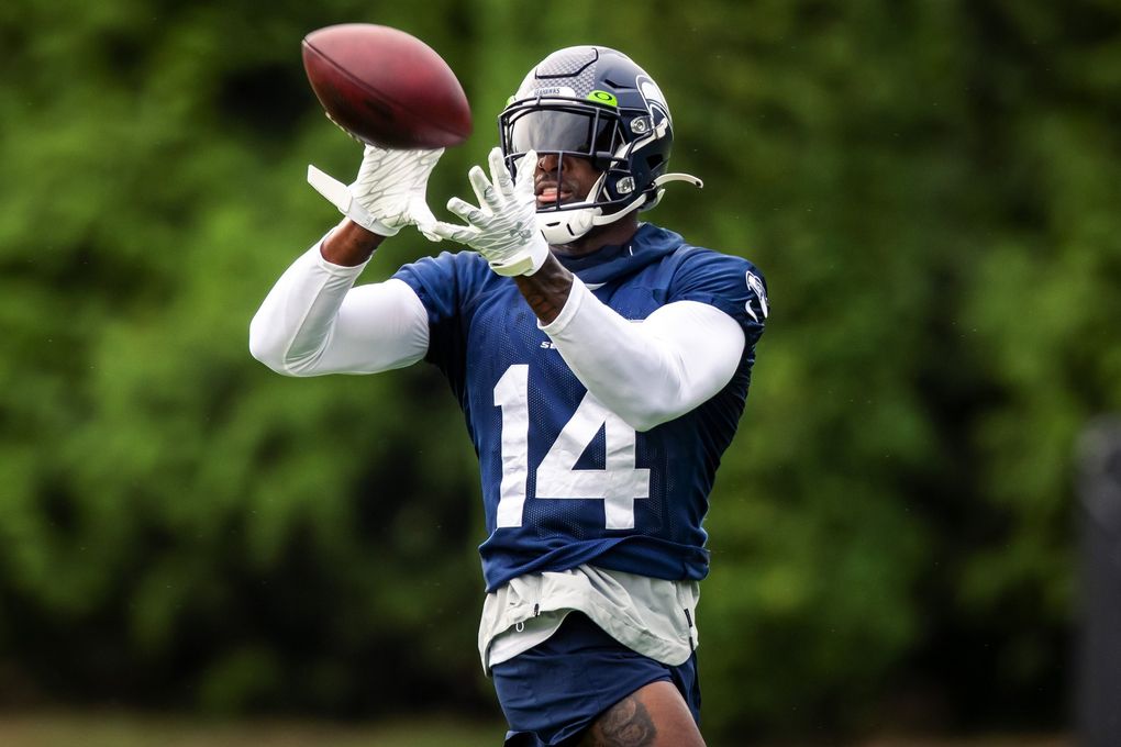 Seahawks wide receiver DK Metcalf makes a catch during Seahawks Training Camp at the Virginia Mason Athletic Center in Renton Saturday, July 31, 2021. (Bettina Hansen / The Seattle Times)