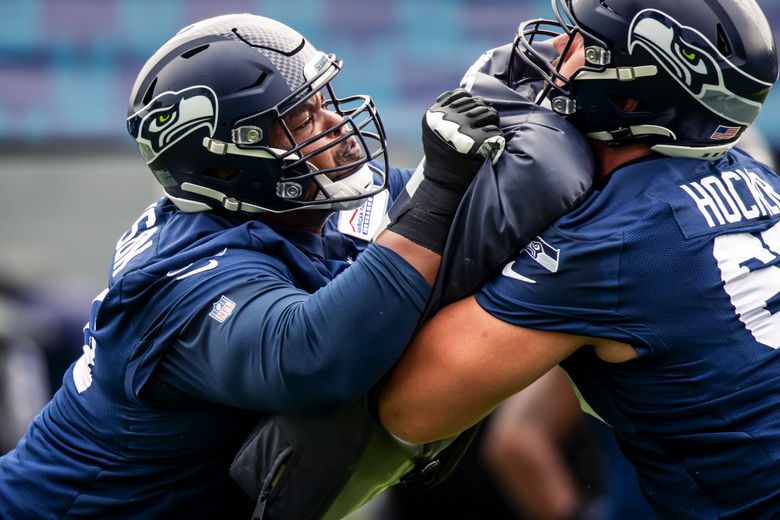 Seattle Seahawks guard Gabe Jackson (66) leaves the field at halftime of an  NFL football game against the Tampa Bay Buccaneers on Nov. 13, 2022, in  Munich. The Buccaneers defeated the Seahawks