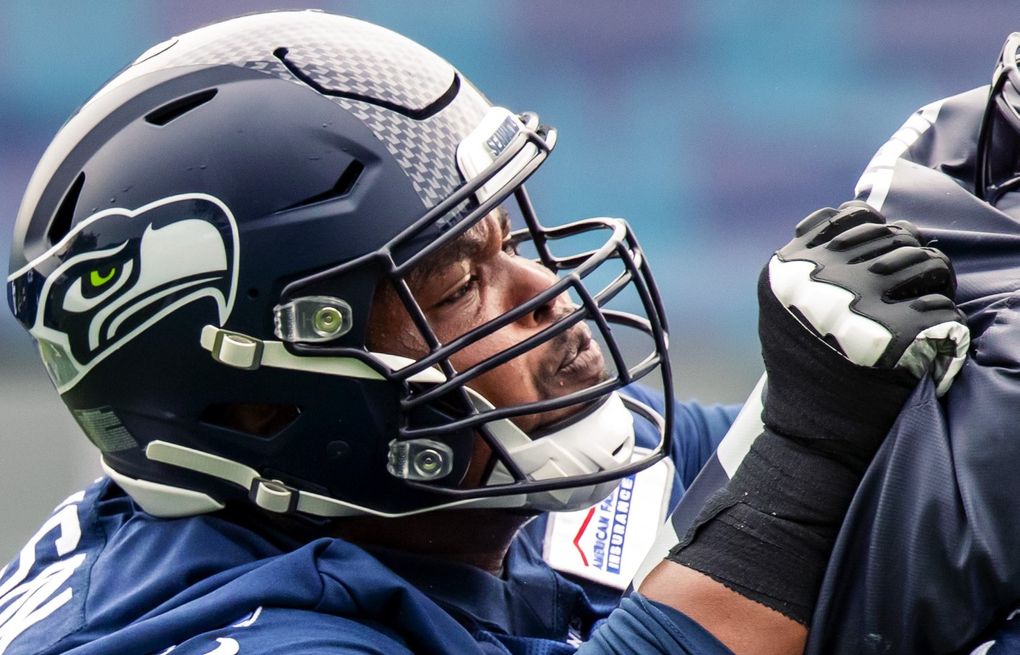 Seattle Seahawks guard Gabe Jackson (66) stands on the field during the  first half of an