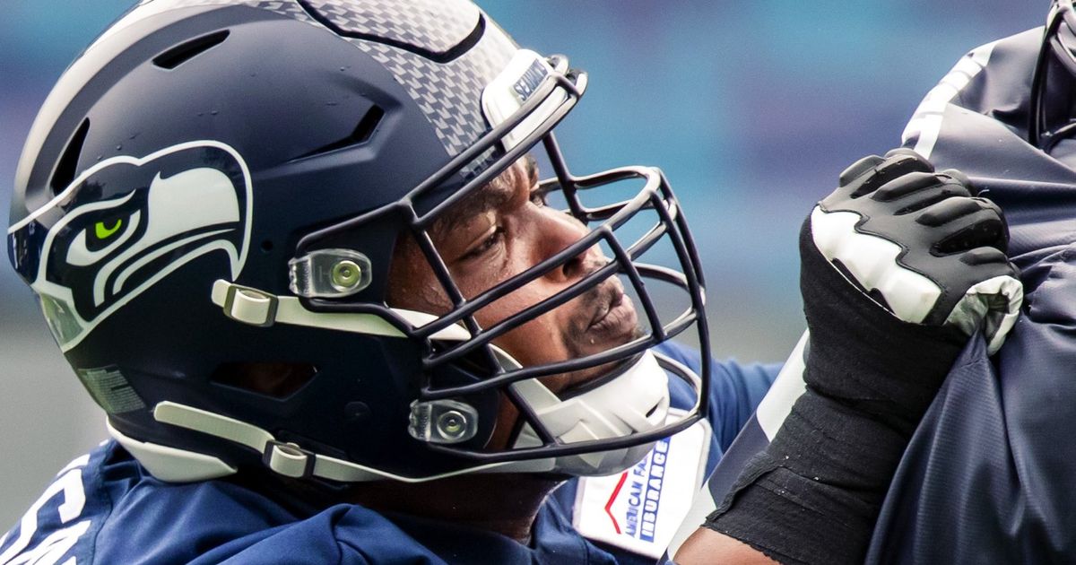 Seattle Seahawks guard Gabe Jackson (66) leaves the field at halftime of an  NFL football game against the Tampa Bay Buccaneers on Nov. 13, 2022, in  Munich. The Buccaneers defeated the Seahawks