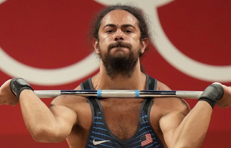 Harrison James Maurus of the United States competes in the men’s 81kg weightlifting event, at the 2020 Summer Olympics, Saturday, July 31, 2021, in Tokyo, Japan. (AP Photo/Luca Bruno) NYOTK NYOTK (Luca Bruno / The Associated Press)