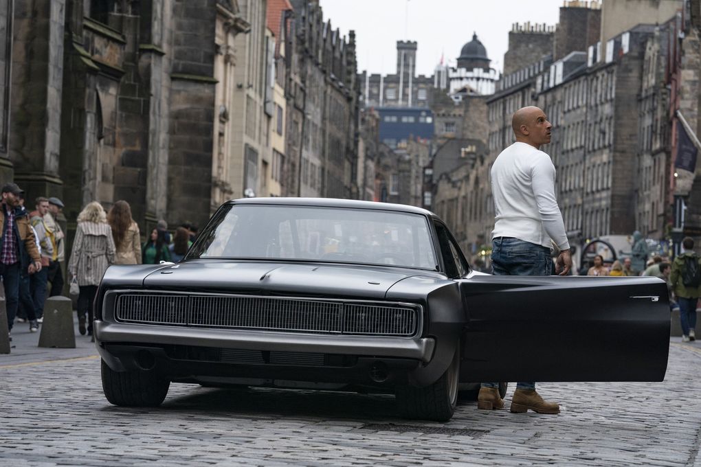 The Dodge Charger in “F9” with co-star Vin Diesel. (Newell Todd / NBC Universal)