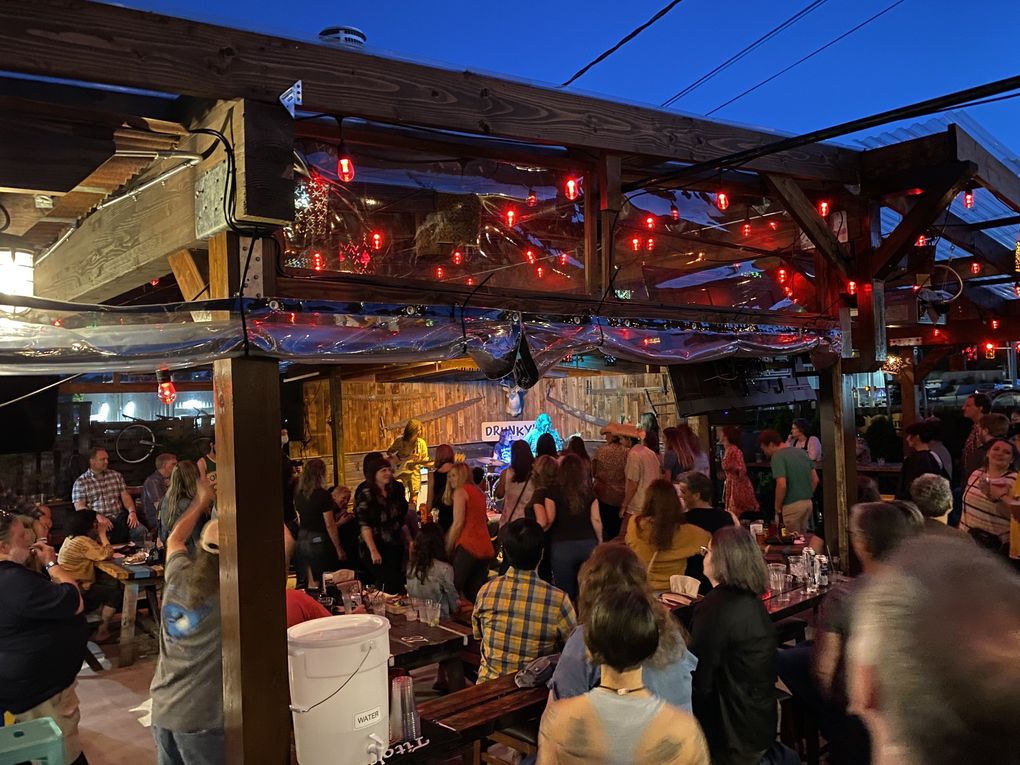 The blues-rocking Betsy Olson Band packed the patio at Drunky Two Shoes in White Center back in June. (Michael Rietmulder / The Seattle Times)