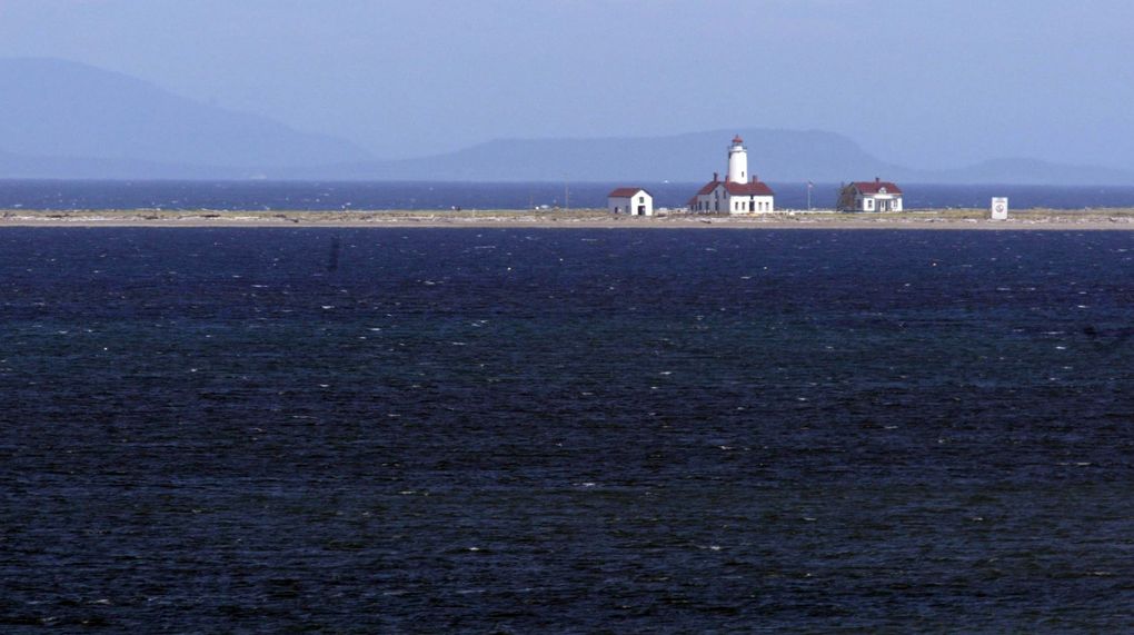 The Dungeness Spit Lighthouse is 63 feet above sea level. Volunteer lighthouse keepers rotate in and out of the buildings, protecting them from vandals. (Greg Gilbert / The Seattle Times)