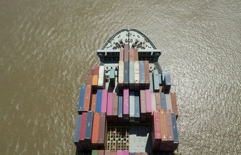 The Mitsui O.S.K. Lines Ltd. Charisma container ship sails near the Yangshan Deepwater Port in Shanghai on April 9. (Bloomberg / Qilai Shen)