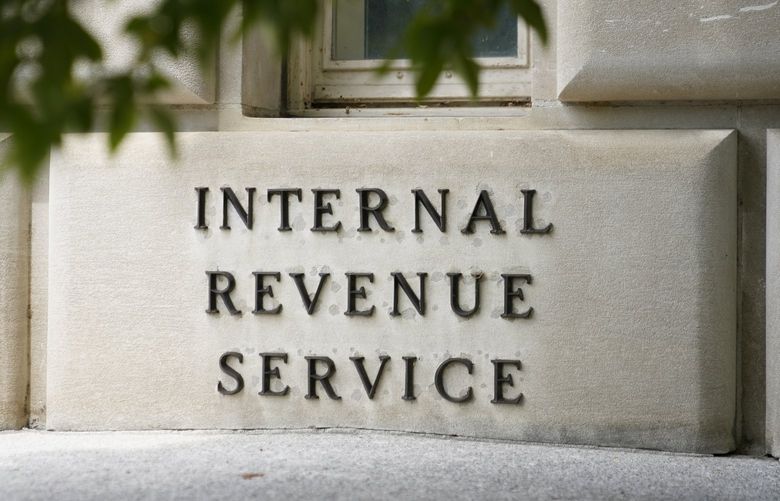 This May 4, 2021, photo shows a sign outside the Internal Revenue Service building in Washington. (AP Photo/Patrick Semansky)