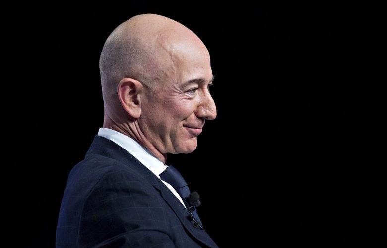 Jeff Bezos, founder and chief executive officer of Amazon.com Inc., listens during a discussion at the Air Force Association’s Air, Space and Cyber Conference in National Harbor, Maryland, U.S., on Wednesday, Sept. 19, 2018. Amazon is considering a plan to open as many as 3,000 new AmazonGo cashierless stores in the next few years, according to people familiar with matter, an aggressive and costly expansion that would threaten convenience chains. Photographer: Andrew Harrer/Bloomberg