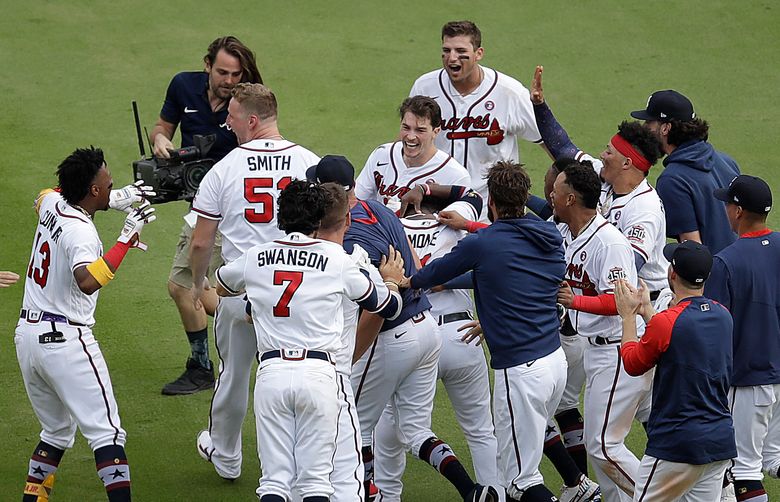 Fried's pinch-hit single lifts Braves past Marlins 8-7 in 10