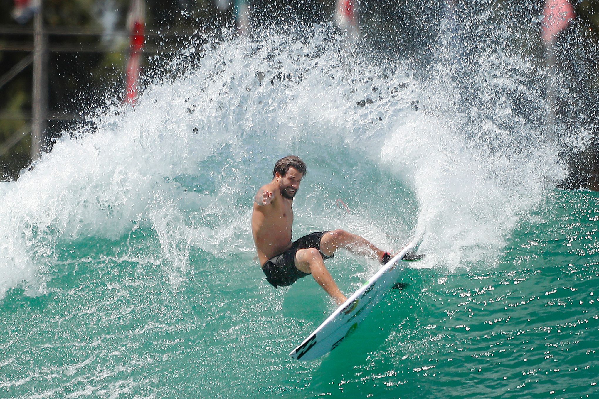 Spectators and surfers flock to the coast as mega swell continues