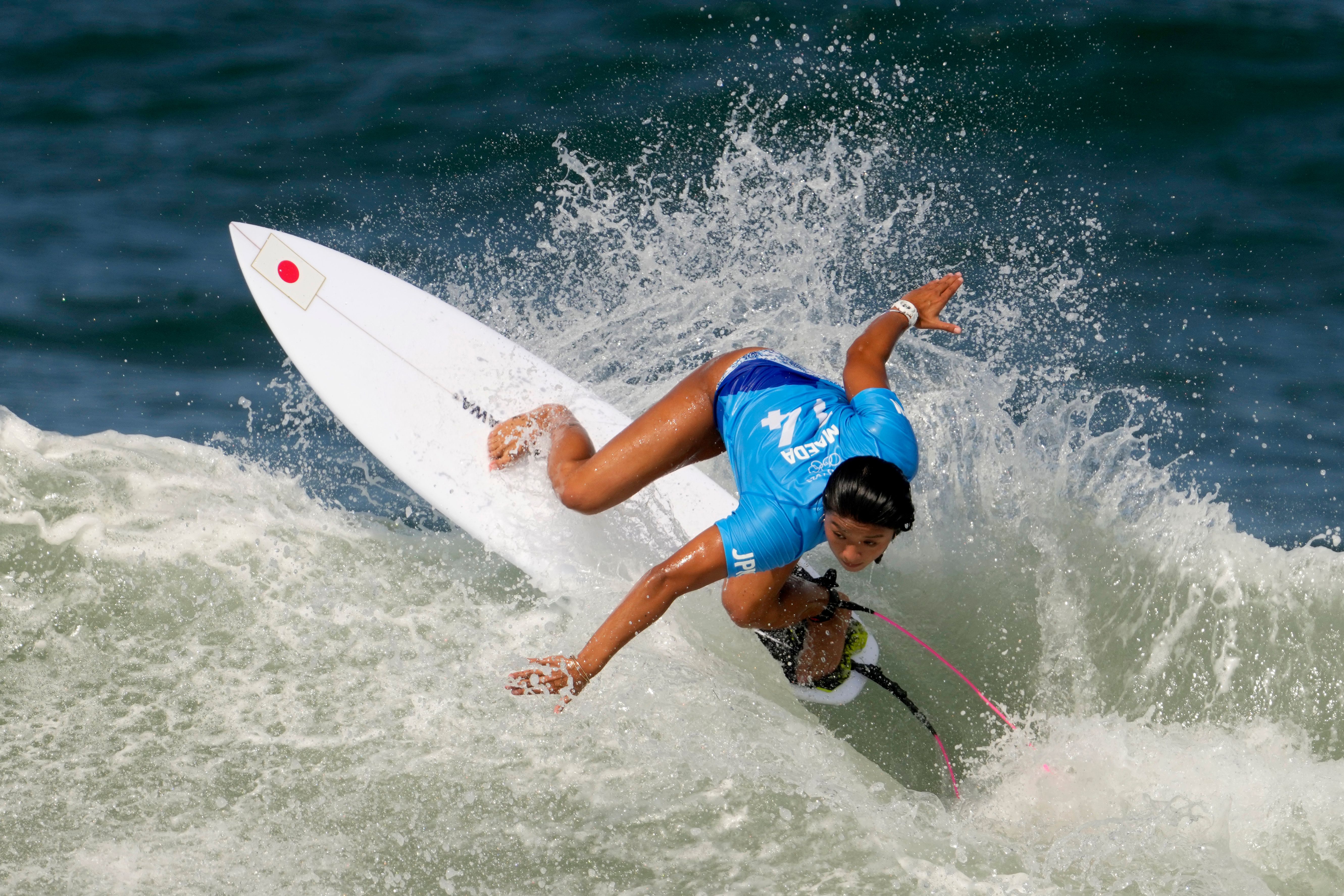 Nerves, joy, and modest waves at surfing's Olympic debut | The