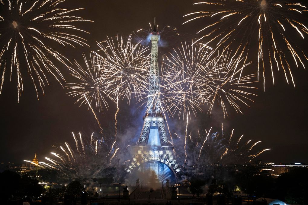 Fireworks illuminate the Eiffel Tower in Paris during Bastille Day celebrations late Wednesday, July 14, 2021. France has celebrated its national holiday with thousands of troops marching in a Paris parade and traditional parties around the country. Last year’s Bastille Day events were scaled back because of virus fears. (AP Photo/Lewis Joly)