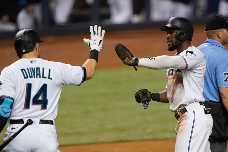 Miami Marlins Adam Duvall (14) runs to first base during a Major