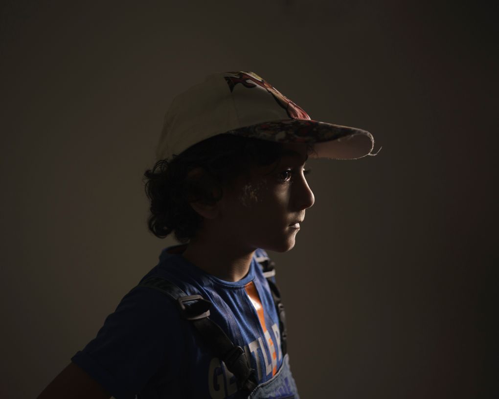 Thaim Abu Oda, 5, poses for a portrait at the end of a therapy session at the Gaza Community Mental Health Programme center in Gaza City, on Thursday, June 10, 2021. For 11 days in May, the boy’s life was devastated by war — by the terrifying boom of fighter jets overhead and the bombs that shook his neighborhood. He stopped eating. He lost more than 5 kilograms (11 pounds). His face became gaunt and his ribs protruded. He lost sleep, too, especially after hearing his grandfather had survived an airstrike on his building and had been hospitalized for breathing problems. (AP Photo/Felipe Dana)