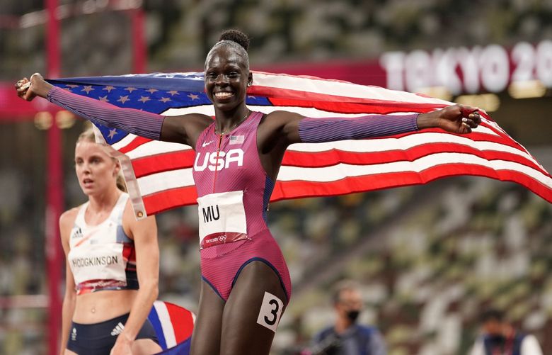 Athing Mu, of United States wins the gold medal in the final of the women’s 800-meters at the 2020 Summer Olympics, Tuesday, Aug. 3, 2021, in Tokyo, Japan. (AP Photo/Martin Meissner) OLYTH284 OLYTH284