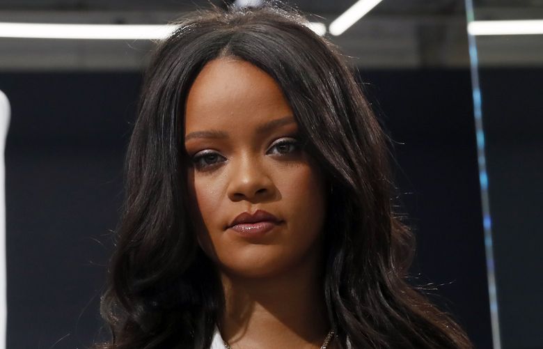 FILE – Rihanna poses as she unveils her first fashion designs for Fenty at a pop-up store in Paris, France, on May 22, 2019. LVMH MoÃ«t Hennessy Louis Vuitton, the worldâ€™s largest luxury group, has put Rihannaâ€™s Fenty fashion collection on hold. The move, confirmed by LVMH Wednesday, comes nearly two years after the fashion conglomerate announced the collaboration with the pop artist and business mogul.  (AP Photo/Francois Mori, File)