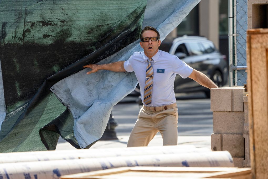This image released by 20th Century Studios shows Ryan Reynolds in a scene from “Free Guy.” (Alan Markfield / 20th Century Studios via The Associated Press)