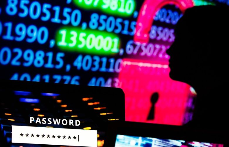 Computer code displayed on screens arranged in Danbury, U.K., on Monday, Jan. 4, 2021. In the spring, hackers managed to insert malicious code into a software product from an IT provider called SolarWinds Corp., whose client list includes 300,000 institutions. 775609530