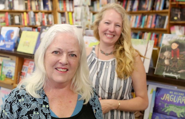 Edmonds Bookshop owner Mary Kay Sneeringer, left, and Michelle Bear, asst. manager. Mary Kay  is selling the shop to Michelle.
(NOTE This isnâ€™t a secret any longer, â€œeveryone knowsâ€)
Photographed Tuesday, August 10, 2021. 217852