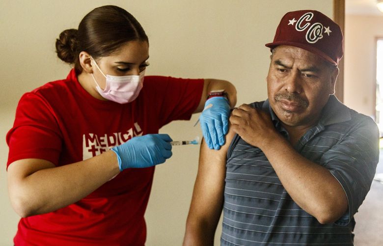 Medical assistant Reina Pérez vaccinates Camerino Vásquez at a pop-up clinic last month for migrant workers hosted by Medical Teams International in Malaga, Chelan County. (Amanda Snyder / The Seattle Times)


Medical assistant Reina Perez, left, vaccinates Camerino Vasquez at a pop-up clinic for migrant workers put on by Medical Teams International in Malaga, Wash. located in Chelan County on Thursday, July 15, 2021.

County-level Covid-19 vaccination data reveals large gaps for Hispanic and Black residents. In Chelan and Douglas County, vaccination rates among the Hispanic population are higher than other counties in Washington state.