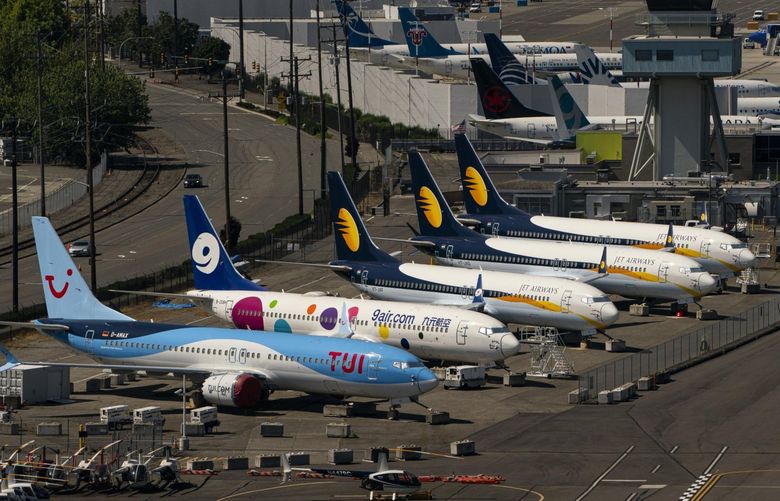 Boeing Co. 737 Max airplanes sit parked at Boeing Field in Seattle, Washington, U.S., on Monday, July 27, 2020. Boeing is scheduled to release earnings figures on July 29. Photographer: David Ryder/Bloomberg