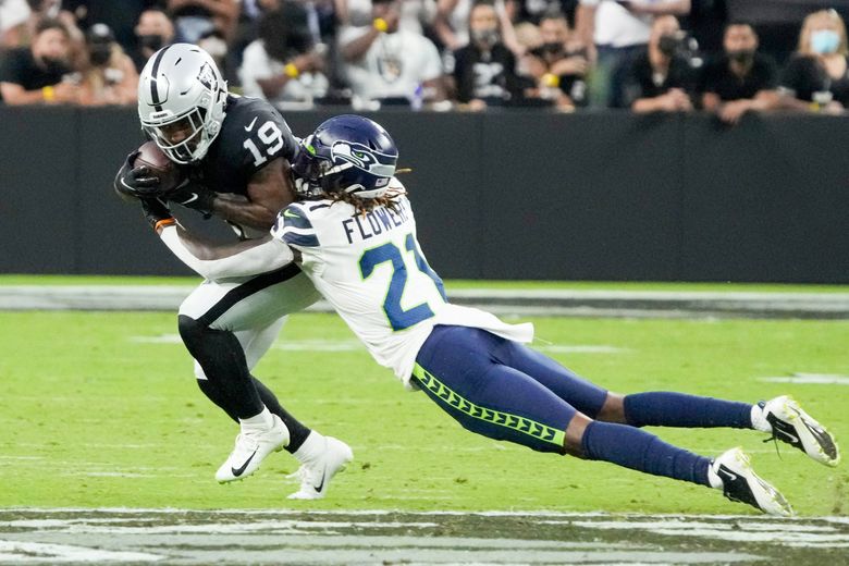 Seattle Seahawks running back SaRodorick Thompson Jr. (29) is tackled by  Green Bay Packers cornerback Shemar Jean-Charles (22) in the second half of  a preseason NFL football game, Saturday, Aug. 26, 2023