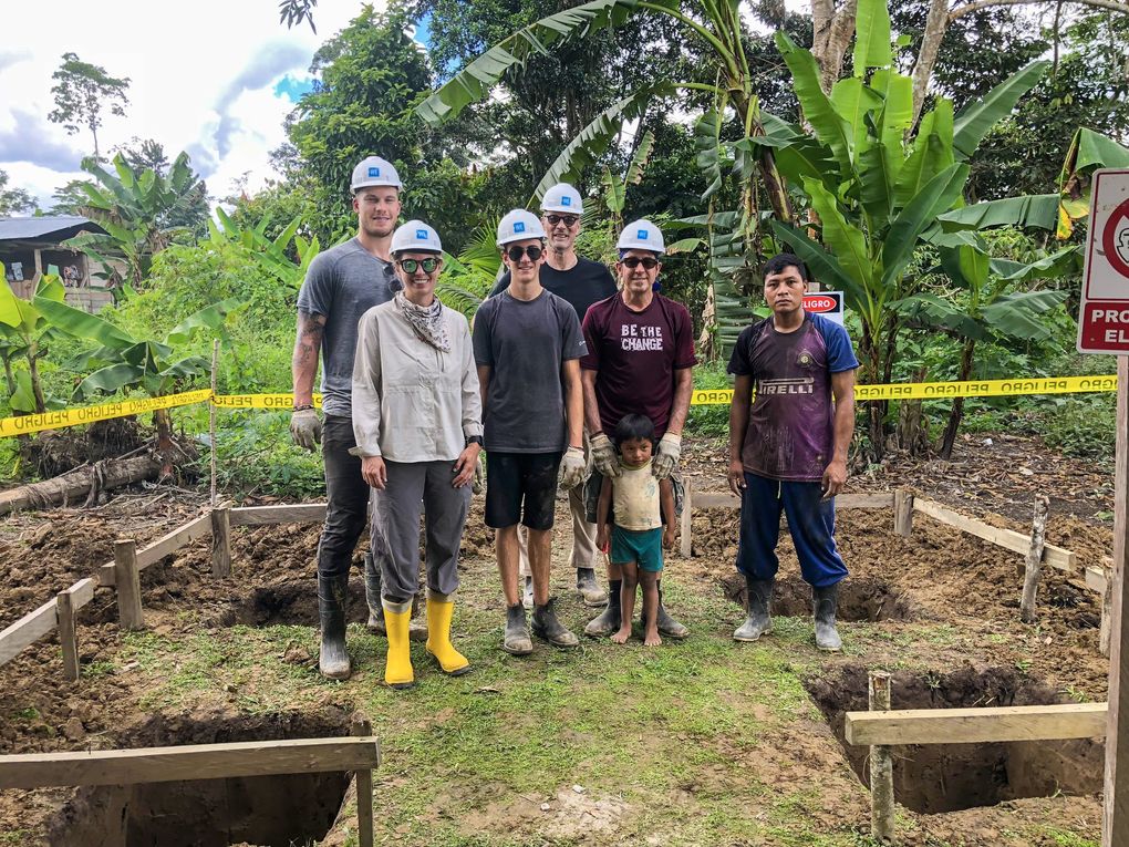 Kraken defenseman Jamie Oleksiak (back left) at work site in a remote Amazon River village in Ecuador in 2018. (Courtesy Jamie Oleksiak)