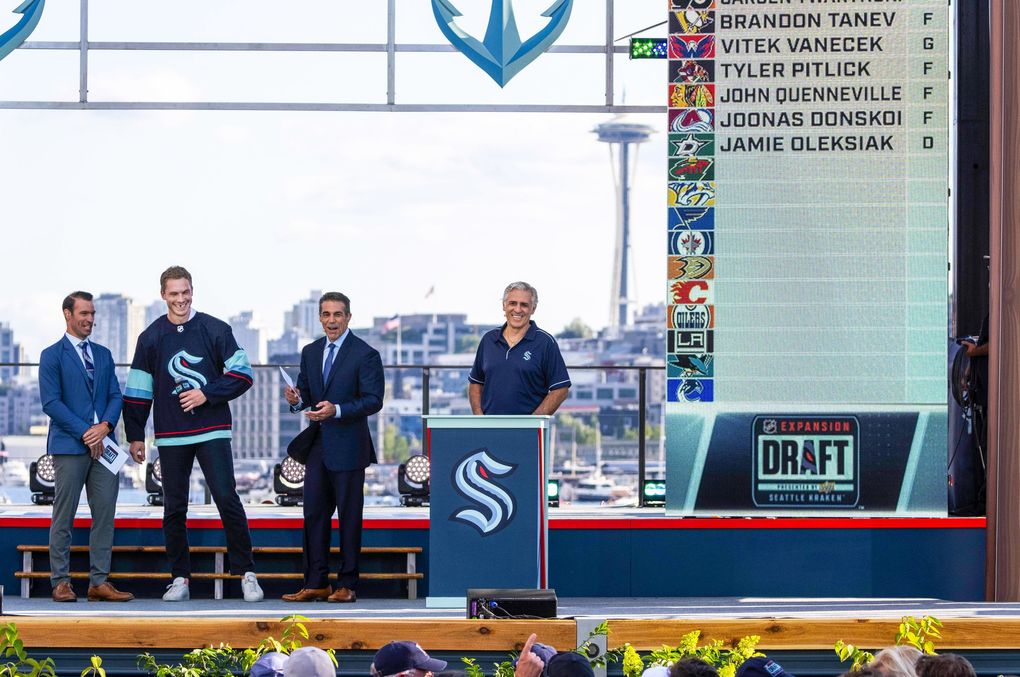 Defenseman Jamie Oleksiak is introduced to Kraken fans during the NHL expansion draft on July 21, 2021 at Gas Works Park in Seattle. (Dean Rutz / The Seattle Times)