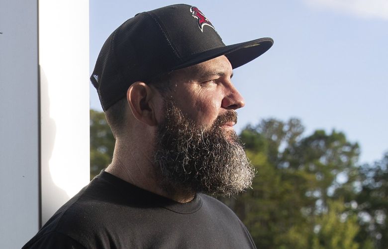 Terry Greear, 43, a school physical education teacher at Cypress Springs Elementary in Orlando, Florida on Friday, August 13, 2021. Greear, who contracted COVID-19 in January, spent 72 days in the hospital. He returned to work last week and is urging everyone who is eligible to get a vaccine. (Willie J. Allen Jr./Orlando Sentinel/TNS)