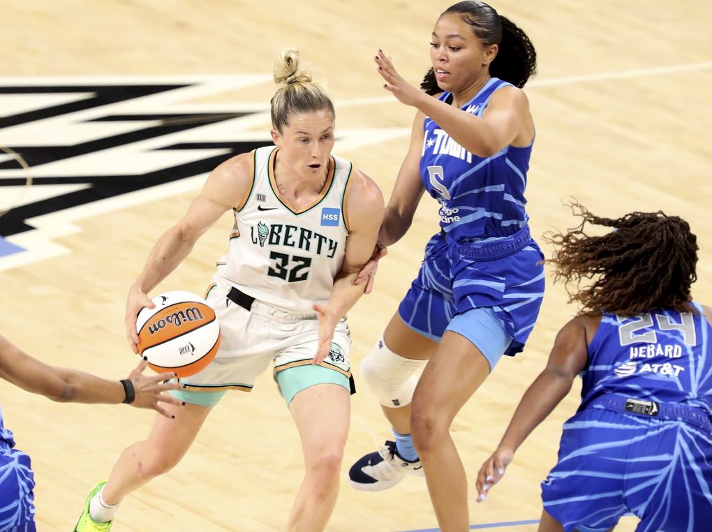 New York Liberty guard Sami Whitcomb (32) tries to protect the ball from Chicago Sky guard Stephanie Watts (5) during a WNBA game, May 23, 2021, in Chicago. (Eileen T. Meslar / AP)