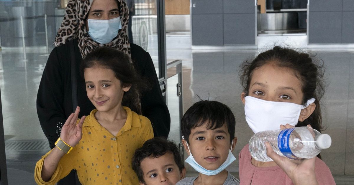 Afghan refugees arrive in U.S., relieved and exhausted The Seattle Times