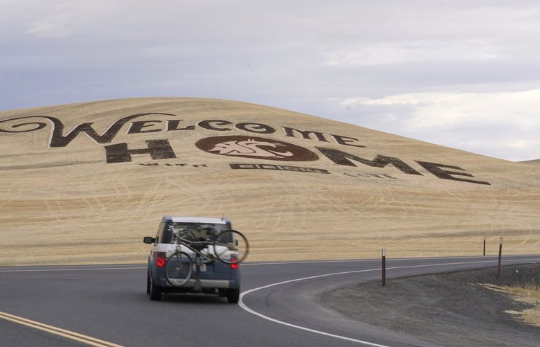 In this photo taken Sunday, Aug. 8, 2021, a sign etched into a harvested wheat field welcoming students back to Washington State University is shown near Pullman, Wash. Monday, Aug. 23 is the first day of classes at the school. WSU will require proof of the COVIDâ€‘19 vaccination for the 2021â€“2022 academic year for all students taking part in classes or other activities on campus, with exemptions allowed for medical, religious or personal reasons. (AP Photo/Ted S. Warren) WATW101 WATW101