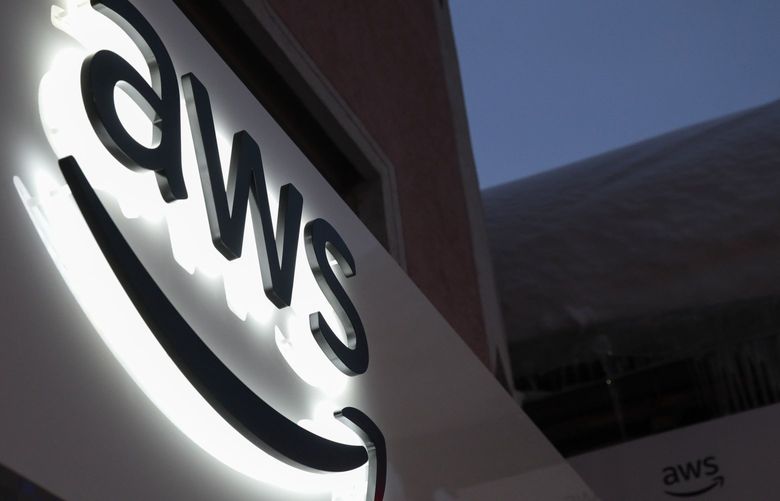 The logo of Amazon Web Services Inc (AWS) is displayed on a sign at a pop-up office ahead of the World Economic Forum (WEF) in Davos, Switzerland, on Monday, Jan. 21, 2019. World leaders, influential executives, bankers and policy makers attend the 49th annual meeting of the World Economic Forum in Davos from Jan. 22 – 25. Photographer: Jason Alden/Bloomberg 775263906
