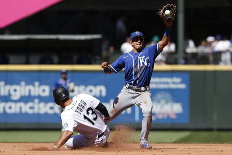 Salvador Perez of the Royals looks out onto the field during the