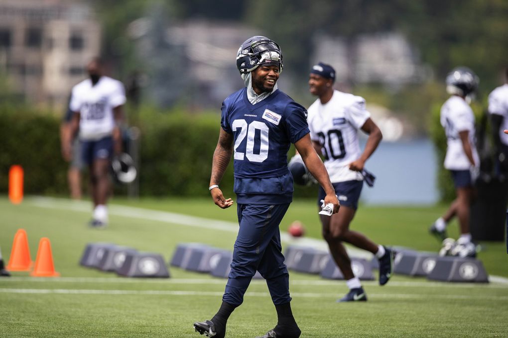 Rashaad Penny heads out for practice, July 28, 2021 at the VMAC in Renton. (Dean Rutz / The Seattle Times)