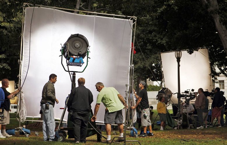 A film crew sets up lights and cameras for shooting the second episode and finishing the pilot for the television series “Franklin & Bash” on the lawn of Los Angeles City Hall on Tuesday, October 5, 2010. (Al Seib/Los Angeles Times/TNS) 25715553W 25715553W