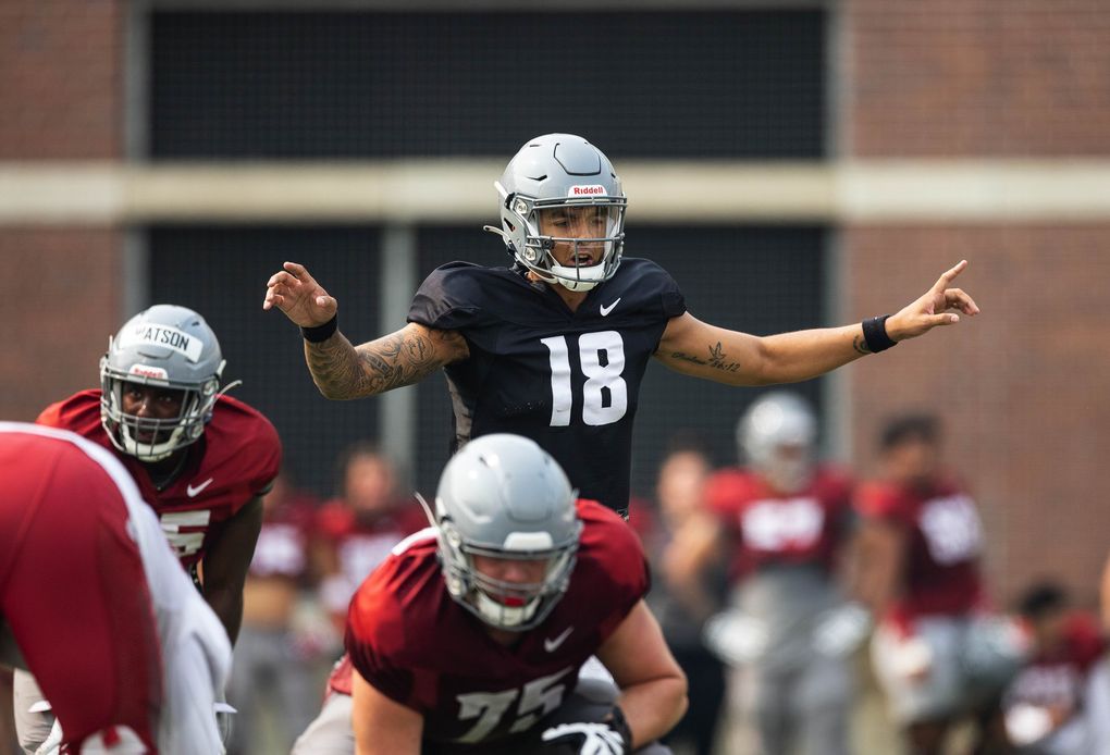 Washington State quarterback Jarrett Guarantano (18) practices, Aug. 12, 2021 at Rogers Field on the WSU campus in Pullman. (Dean Rutz / The Seattle Times)