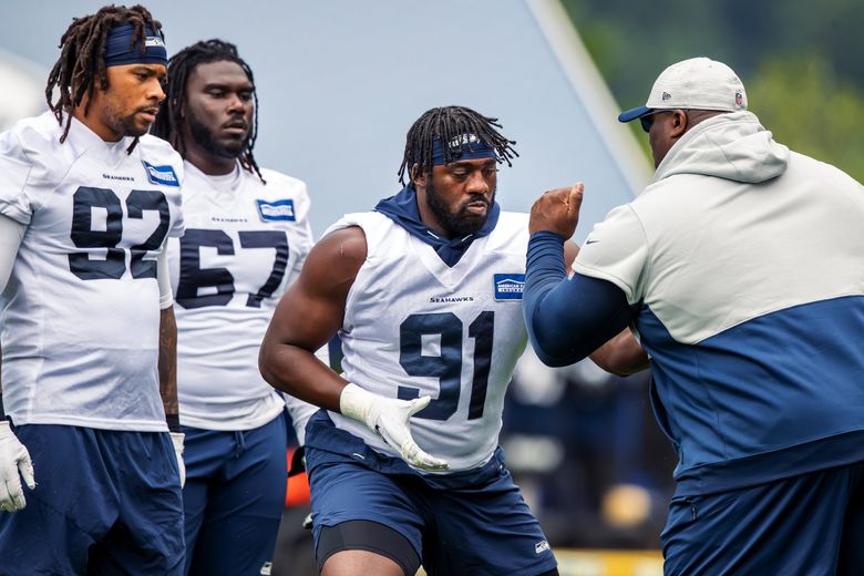 Seattle Seahawks' L.J. Collier walks off the field after an NFL