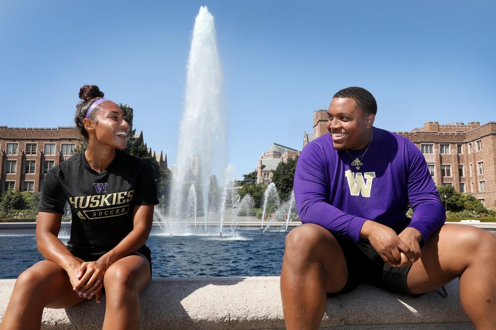 UW soccer player MaKayla Woods and UW Track and Field discus thrower Elijah Mason, seen on campus at the Drumheller Fountain, are the co-presidents of UW’s Black Student Athlete Alliance. (Ken Lambert / The Seattle Times)