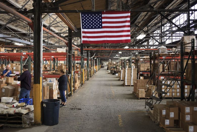 A U.S. flag in a warehouse at the Fiesta Tableware Co. factory in Newell, West Virginia, U.S., on Thursday, July 22, 2021. Markit is scheduled to release manufacturing figures on August 2. (Bloomberg)