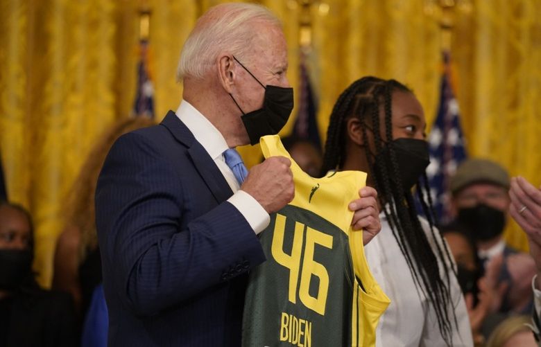 The 2020 WNBA champion Seattle Storm celebrate their achievement at the White House with president Joe Biden Monday, August 23, 2021.