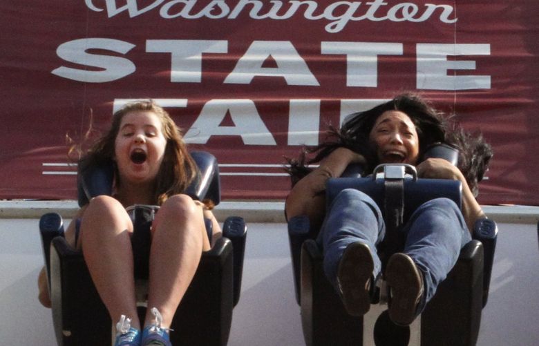 It’s called the Extreme Scream for a reason sending riders 20-stories up before dropping them 185-feet at the Washington State Fair in Puyallup on Friday, September 11, 2015, day one of the fair.  The ride exerts more than 3G’s up and minus 1G down.
LO Linesonly