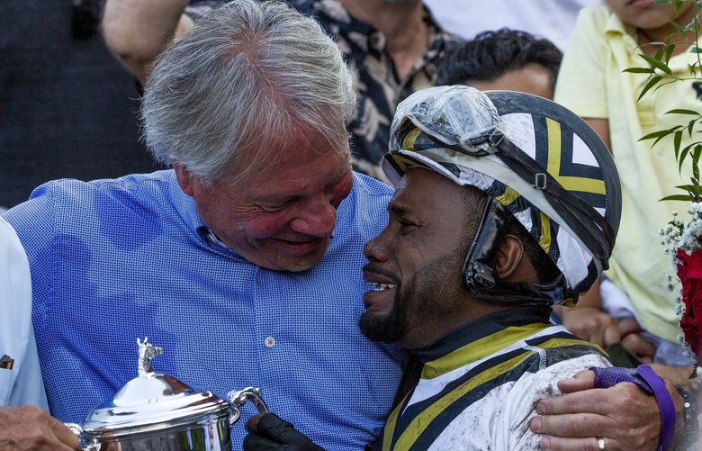 AUBURN- LONGACRES MILE – 081521


From left; Jack Hodge, the Vice President of Emerald Downs and Bob Rondeau, a retired American sports announcer for The Univerity of Washington and winning jockey Rocco Bowen celebrates the win at the 86th Longacres Mile Handicap on Sunday, August 15, at Emerald Downs in Auburn, WA.